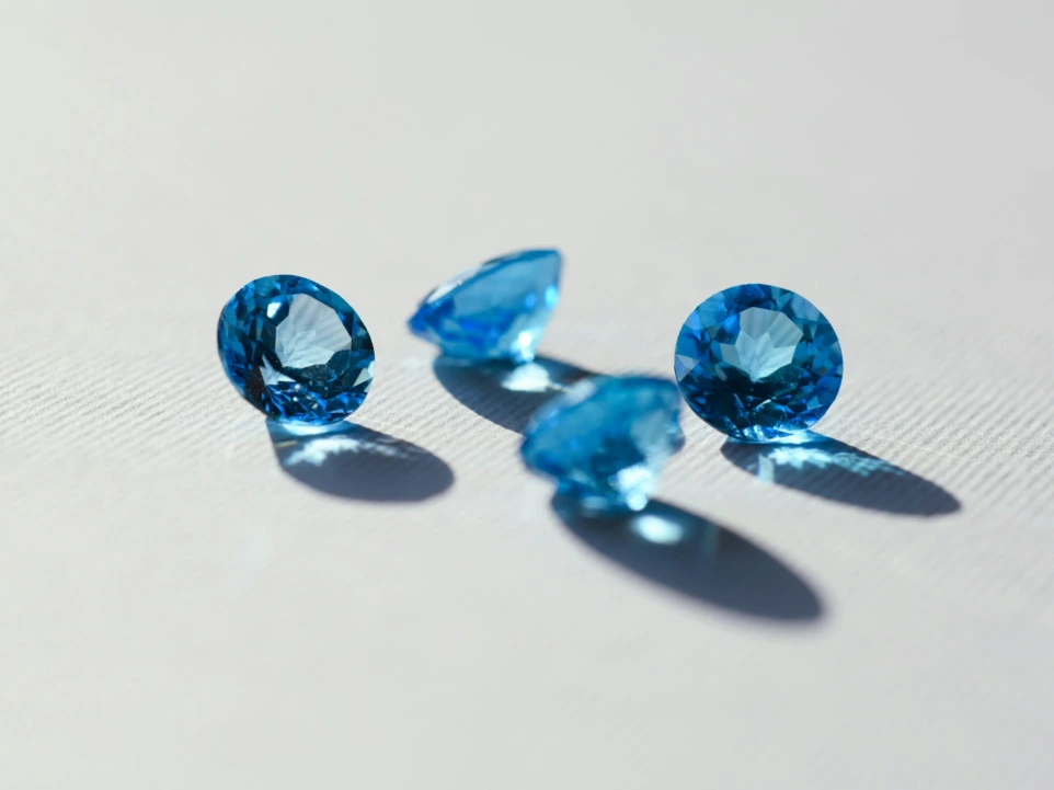 blue stone on white surface